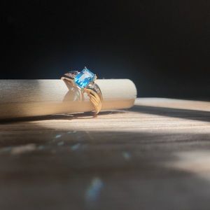 Blue Topaz and Diamond Ring with Gold Band